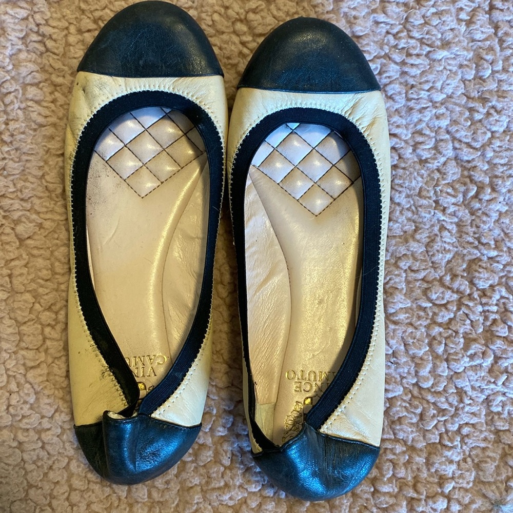 Tan and black flats